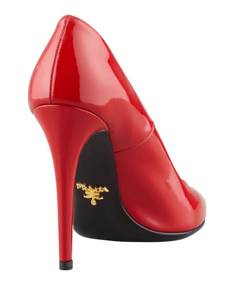 red and black prada|Prada heels red bottom.